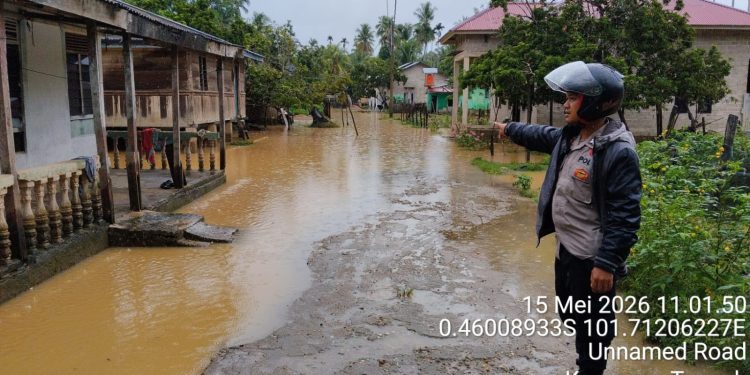 Polsek Pangean dan Kuantan Hilir Intensif Monitoring Banjir di Wilayah Terdampak