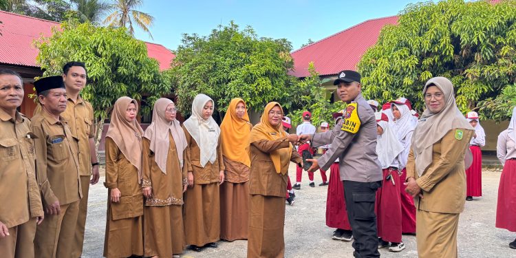 Polsek Kuantan Mudik Laksanakan Program Green Policing dan Gerakan Cinta Lingkungan di Desa Pisang Berebus