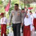 Kapolres Kampar Hadir Di Desa Sungai Paku – Cek Jembatan Baru Dan Bagikan Bansos