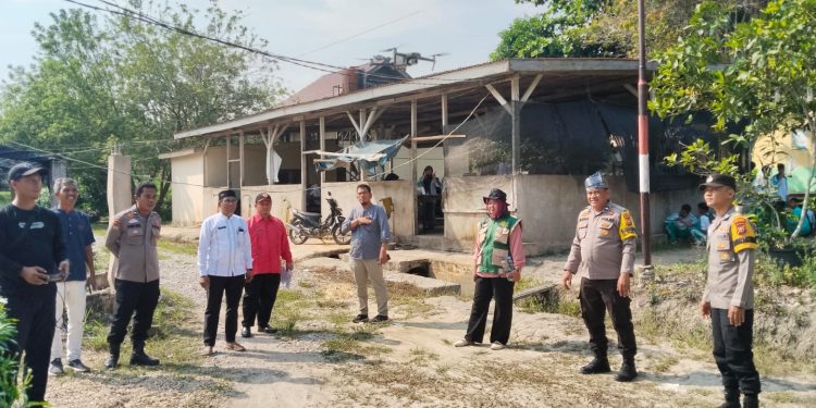 Polsek Pangkalan Kuras bekerja sama dengan kelompok tani di Lahan 20 Ha di SMKN 1 dan Desa Harapan Jaya, untuk ketahanan pangan