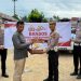 Sambut HUT Bhayangkara ke-80, Satlantas Polres Kuansing Salurkan Bantuan Sosial kepada Pengemudi Ojek dan Sopir Angkutan Umum