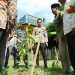Kapolres Kuansing Pimpin Green Policing di Pangean, Penanaman Bibit Jadi Komitmen Bersama Lestarikan Lingkungan
