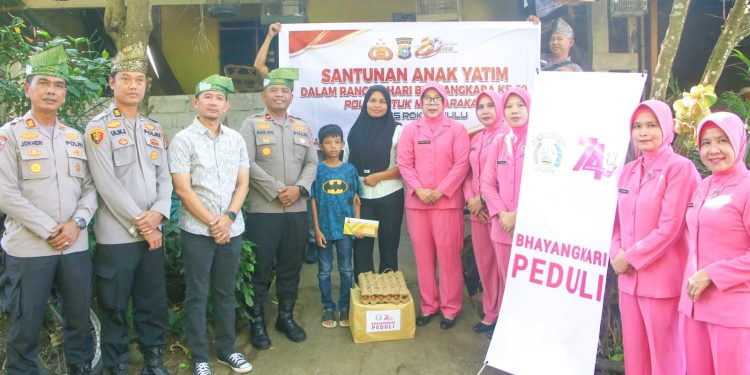 Penuh Haru, Kapolres Rohul Beri Dukungan untuk Personel Sakit Menahun dan Santuni Anak Yatim
