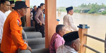 Polres Kuansing Pastikan Hari Pertama Pacu Jalur Rayon III di Benai Berlangsung Aman, Ribuan Penonton Padati Arena