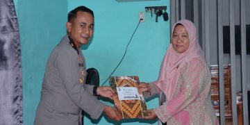 Polres Kampar Salurkan Tali Asih kepada Keluarga Almarhum AIPTU Zainal Efendi Menulis