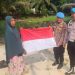 Ekspedisi Merah Putih Sipropam Polres Pelalawan Kibarkan 30 Bendera di Desa Rantau Baru