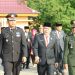 Wakapolres Kuansing Hadiri Upacara Penurunan Bendera HUT ke-81 RI di Lapangan Limuno