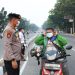 Antisipasi Dampak Asap Karhutla, Polda Riau Bagikan 2.500 Masker kepada Warga Pekanbaru