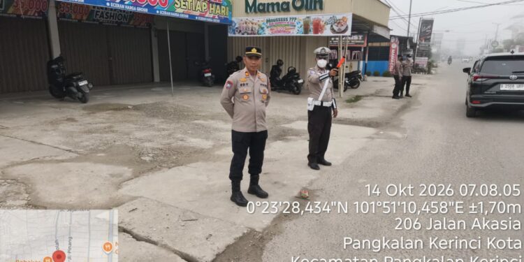 Polres Pelalawan Hadir di Tengah Masyarakat, Gelar Strong Point dan Sapa Warga untuk Ciptakan Rasa Aman